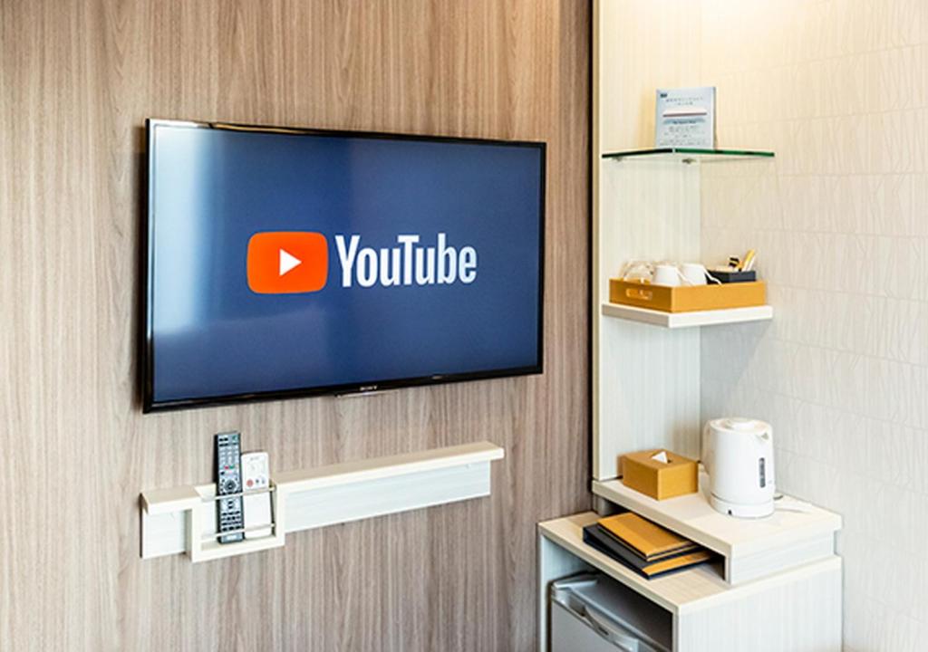 TV a/nebo společenská místnost v ubytování The Rise Osaka Kitashinchi
