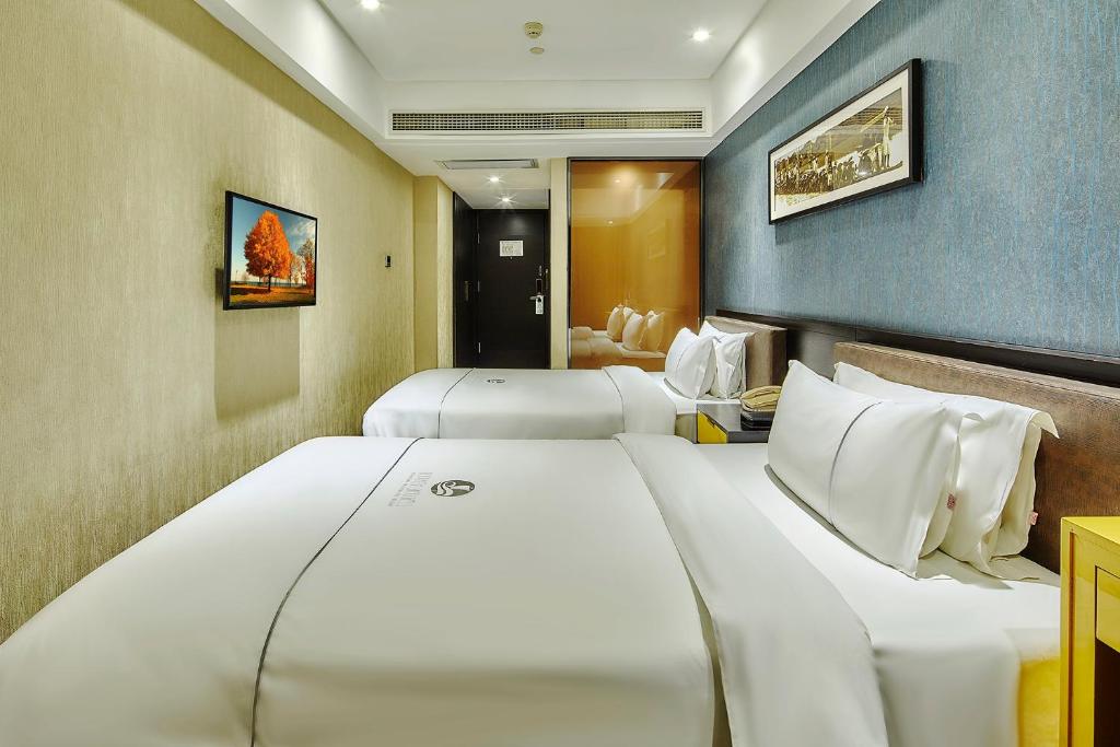Insail Hotels -Huanshi Road Taojin Metro Station Guangzhou- Free shuttle bus for Canton Fair - Salle Jumelle Standard