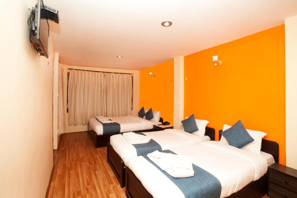 Postel nebo postele na pokoji v ubytování Hotel Green Horizon