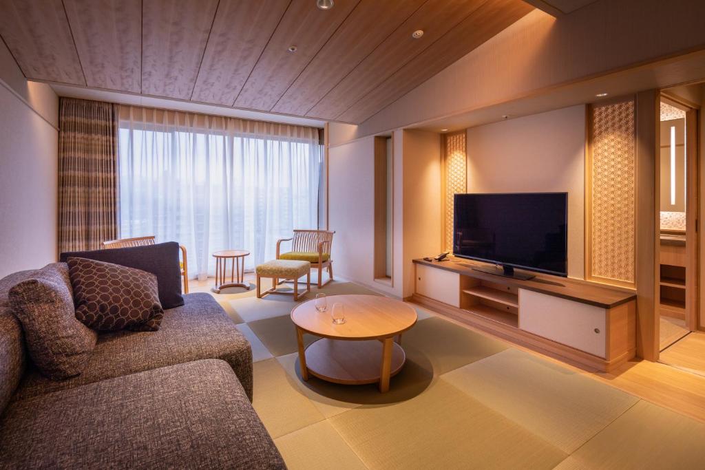 TV a/nebo společenská místnost v ubytování Hotel Wakamizu