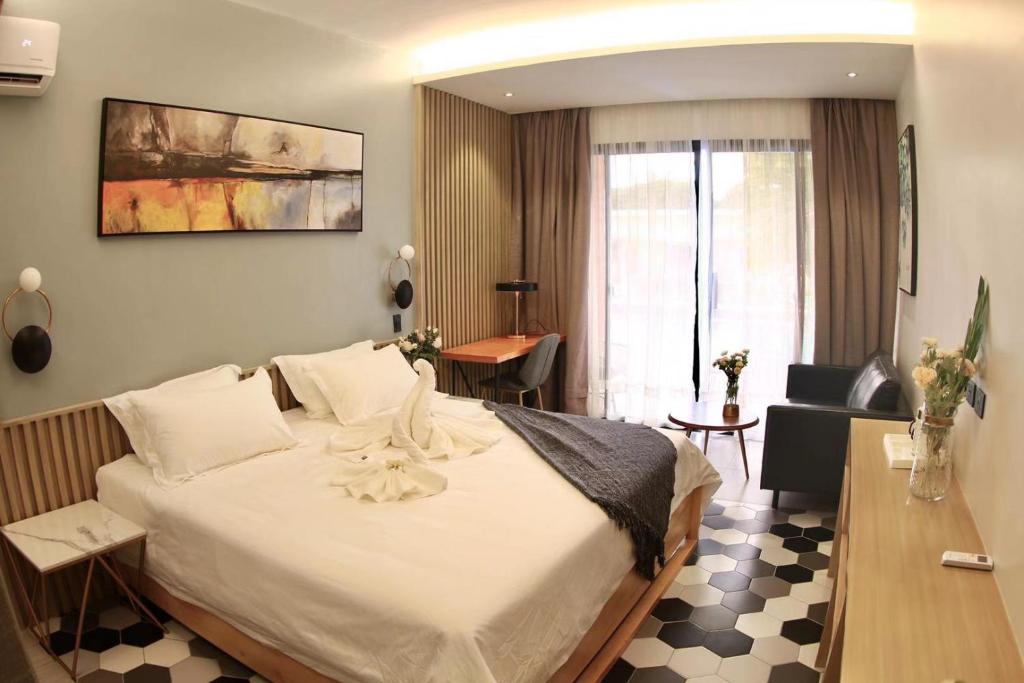 Postel nebo postele na pokoji v ubytování Only Seed Resort 欧芮希度假酒店