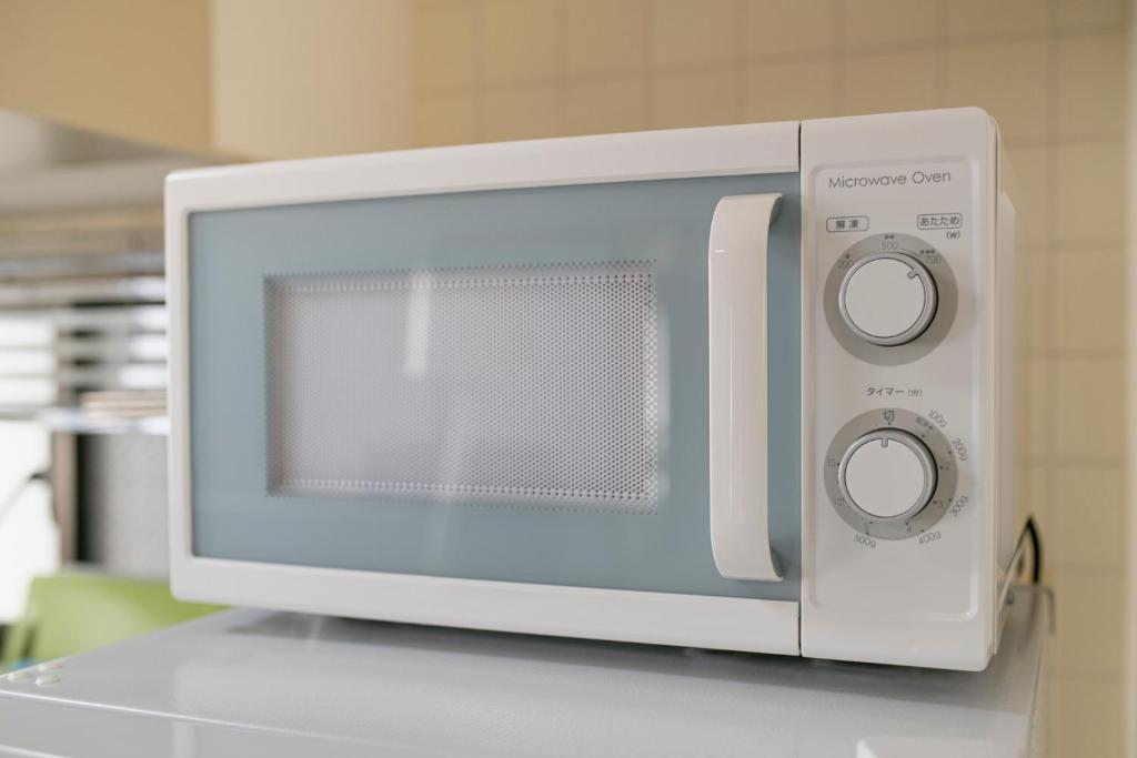 Kuchyň nebo kuchyňský kout v ubytování Uhome Akihabara Apartment 3