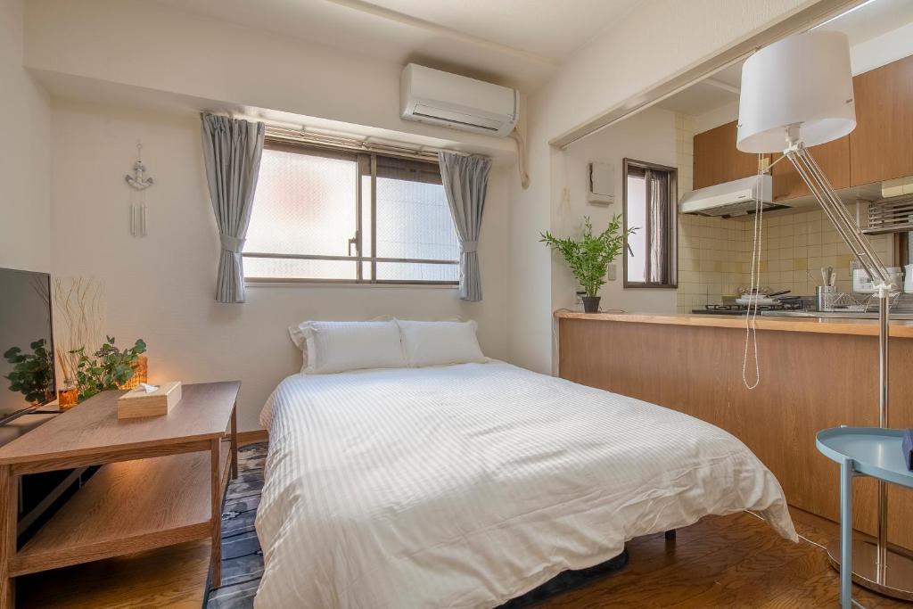 Kuchyň nebo kuchyňský kout v ubytování Uhome Akihabara Apartment 3