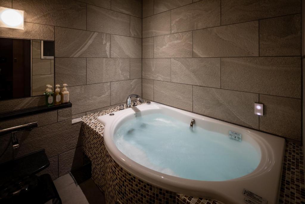 Koupelna v ubytování Hotel Wakamizu