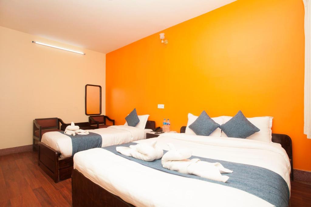 Postel nebo postele na pokoji v ubytování Hotel Green Horizon