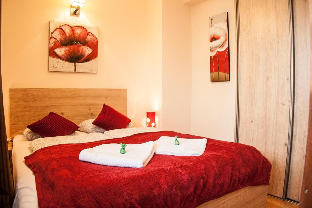 Posteľ alebo postele v izbe v ubytovaní Apartamenty Smrekowa Zakopane