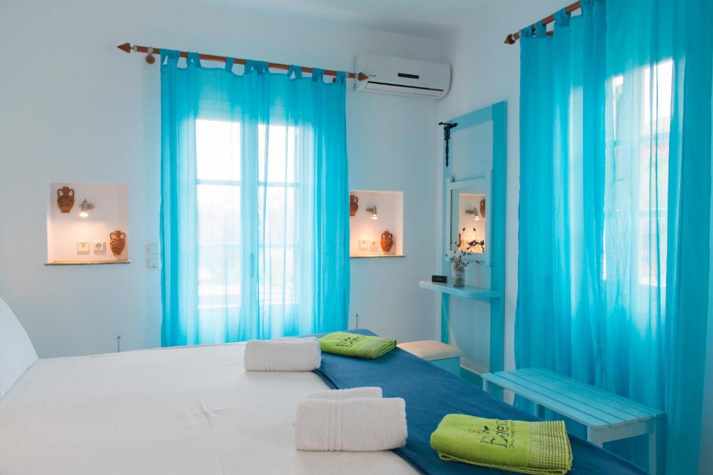 Postel nebo postele na pokoji v ubytování Edem Hotel