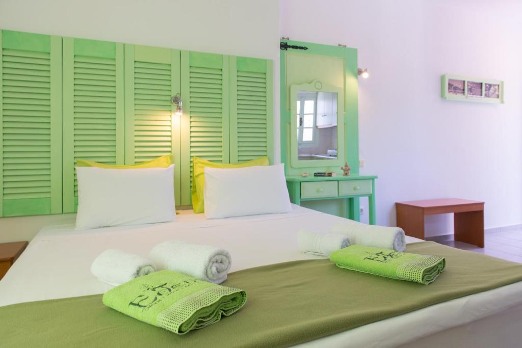 Postel nebo postele na pokoji v ubytování Edem Hotel