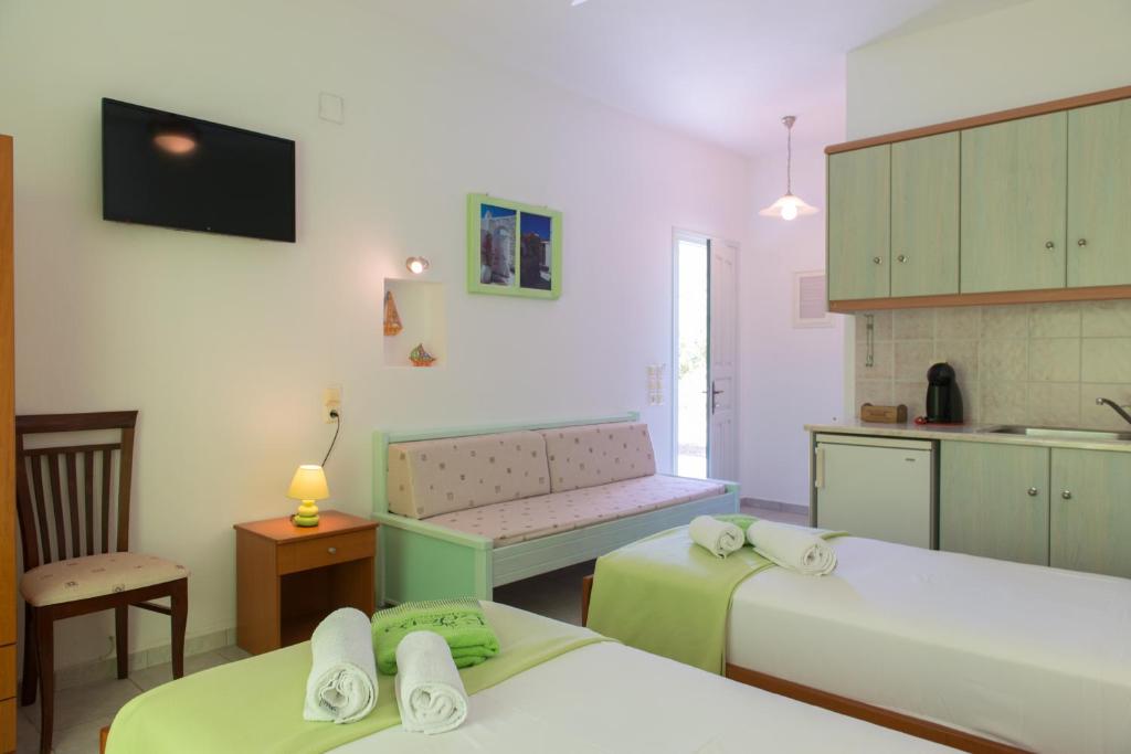 Postel nebo postele na pokoji v ubytování Edem Hotel