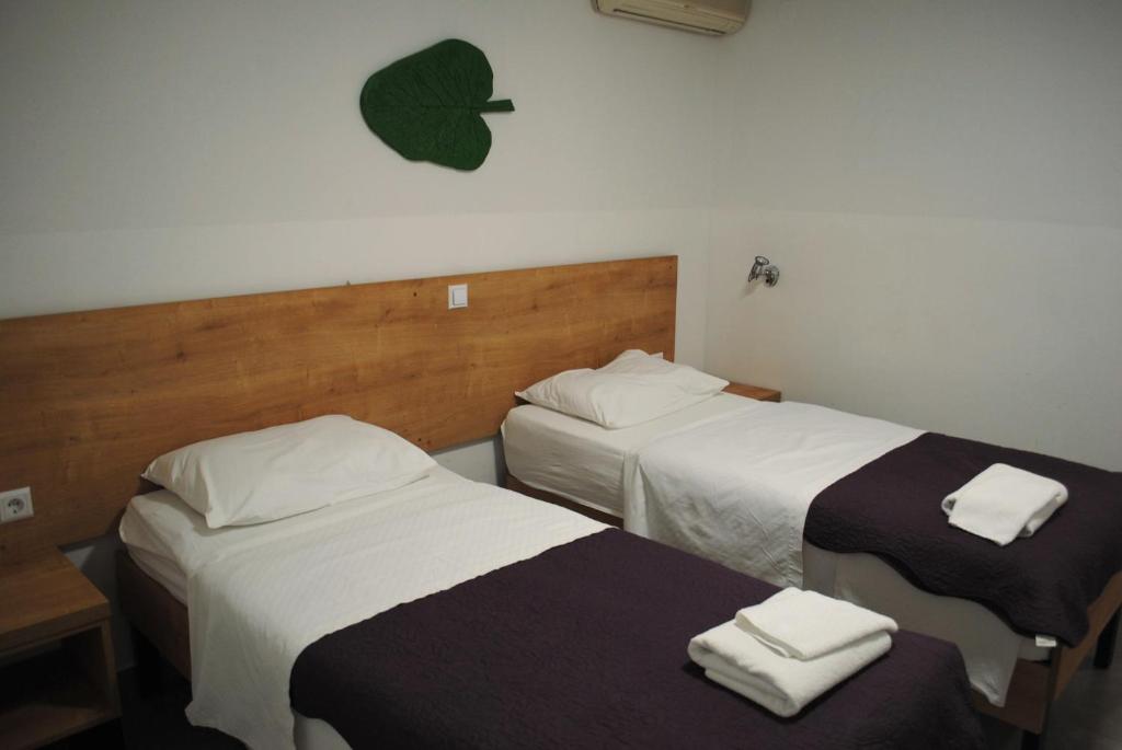 Postel nebo postele na pokoji v ubytování Hotel Fala Zagreb
