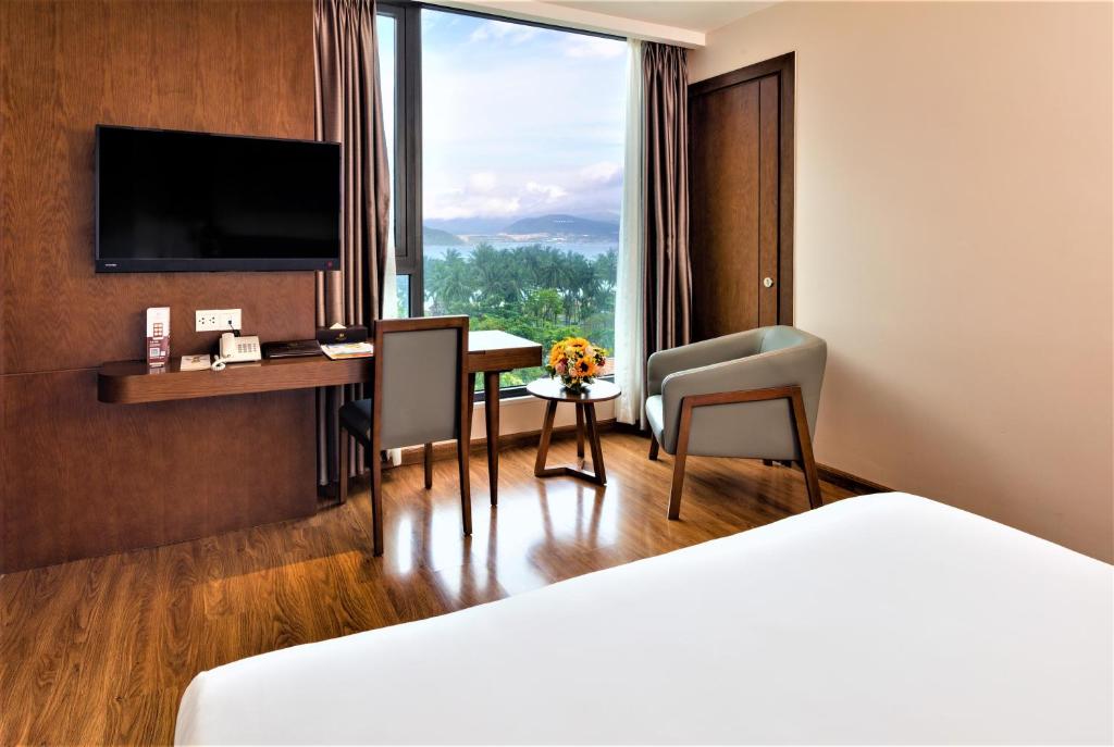 TV/trung tâm giải trí tại DTX Hotel Nha Trang