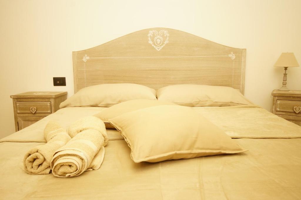 Postel nebo postele na pokoji v ubytování Cascina Bucolica B&B