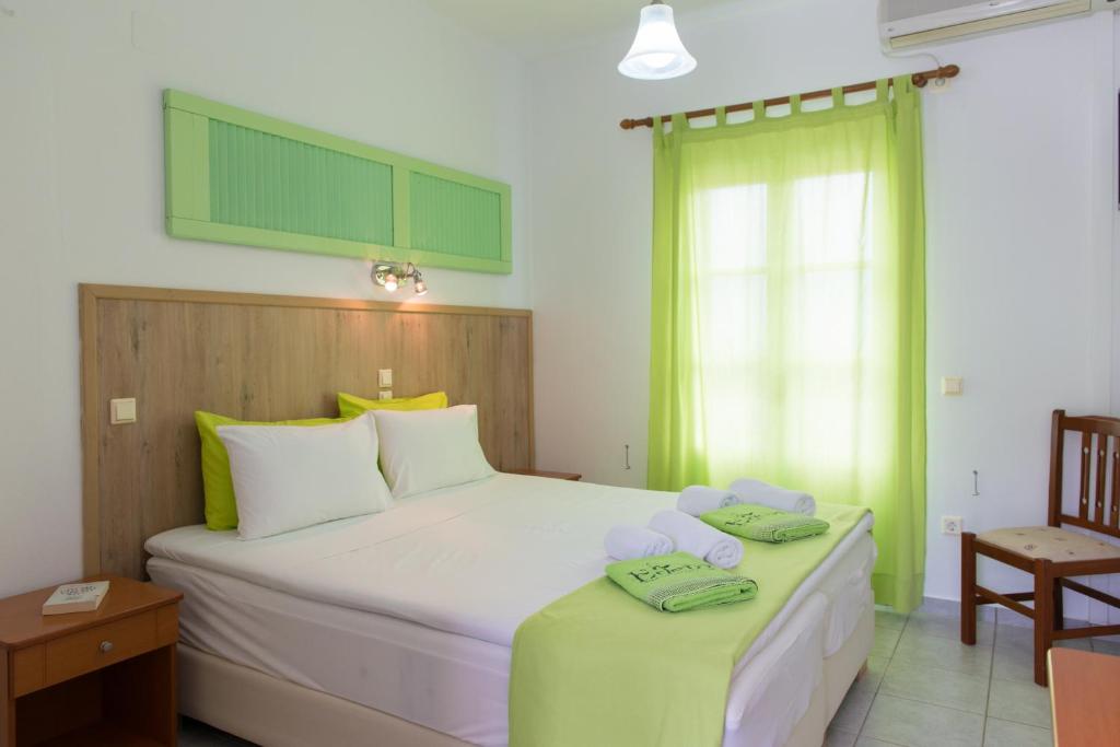 Postel nebo postele na pokoji v ubytování Edem Hotel