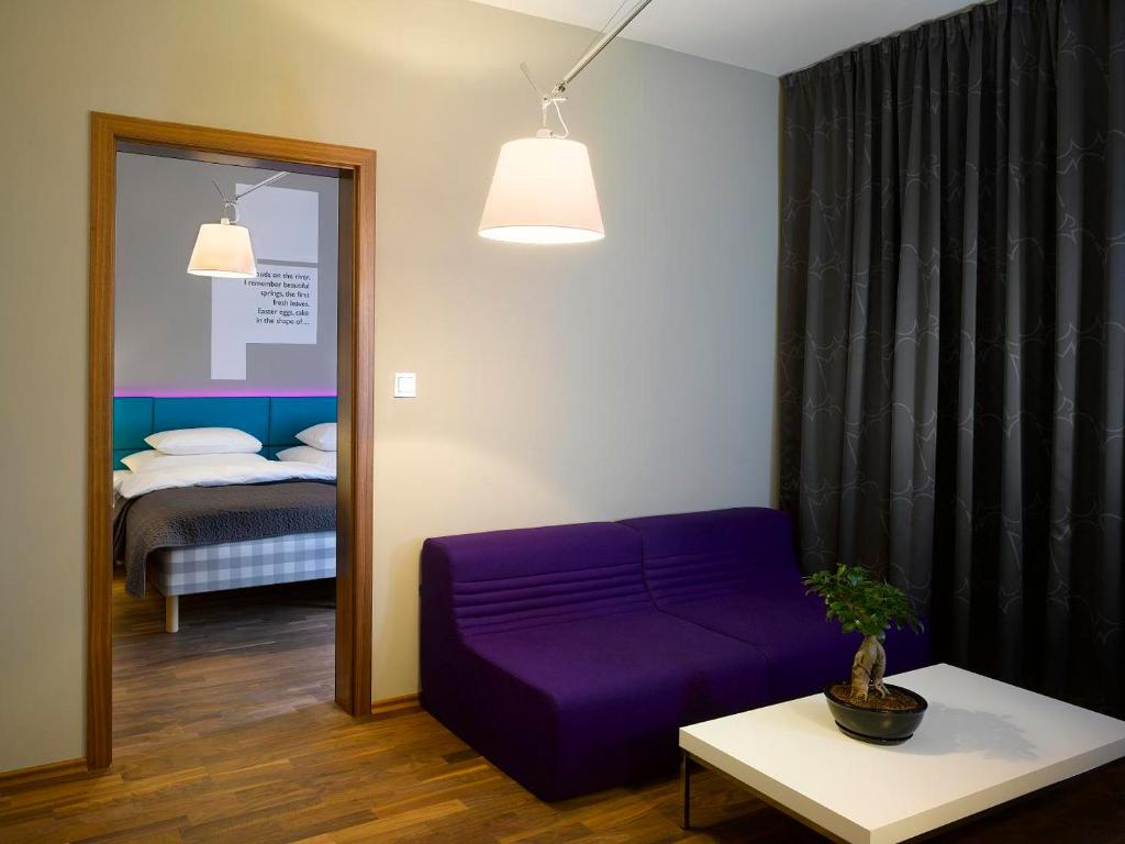 Postel nebo postele na pokoji v ubytování MOODs boutique hotel