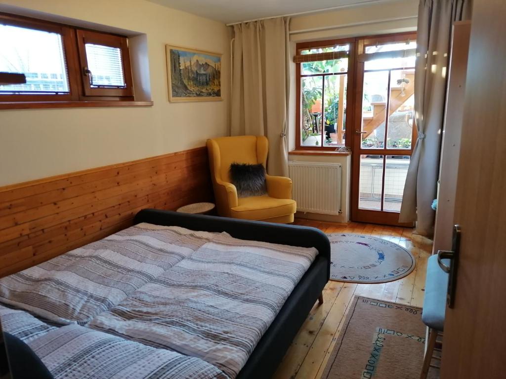 Postel nebo postele na pokoji v ubytování Family House - Apartmany Zuzana