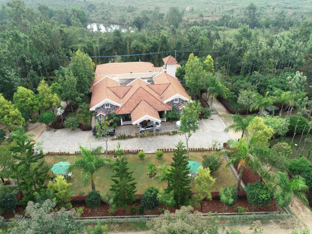 an aerial view of a house with a garden at The Vintage Chikmagalur in Chikmagalūr