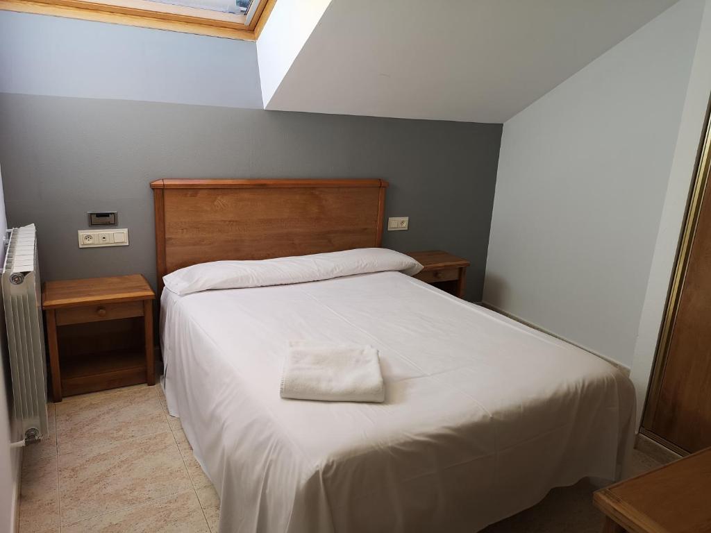 Postel nebo postele na pokoji v ubytování Ciudad de Jaca