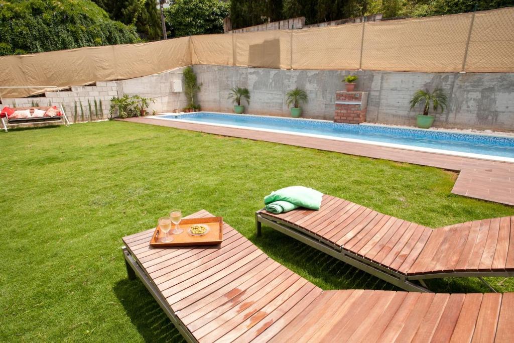 Bazén v ubytování Casa Vacacional Dhalia nebo v jeho okolí