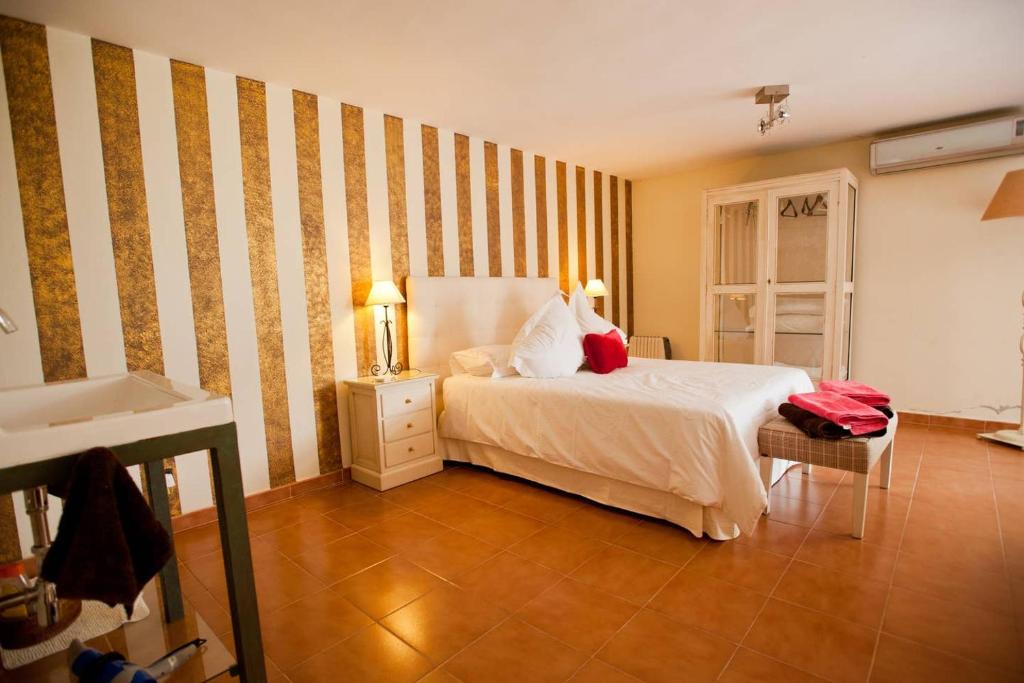 Postel nebo postele na pokoji v ubytování Casa Vacacional Dhalia