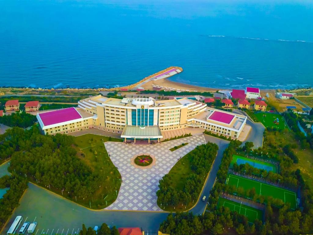 an overhead view of the resort with the ocean in the background at Khazri in Baku