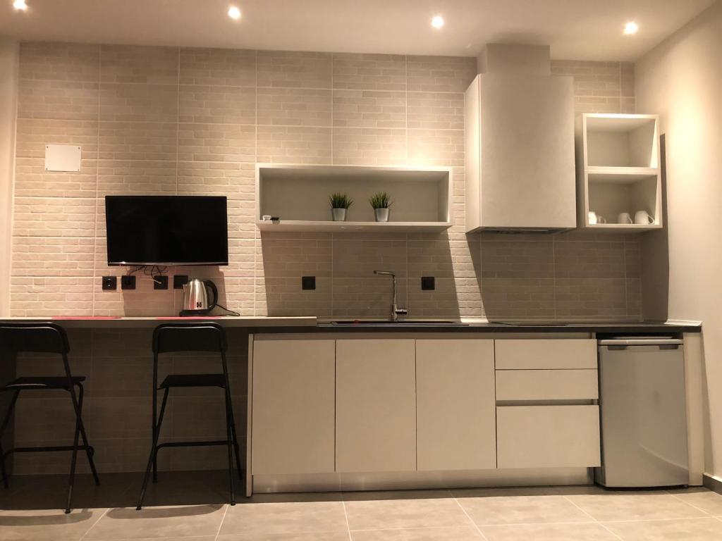 Kuchyň nebo kuchyňský kout v ubytování siviri suites