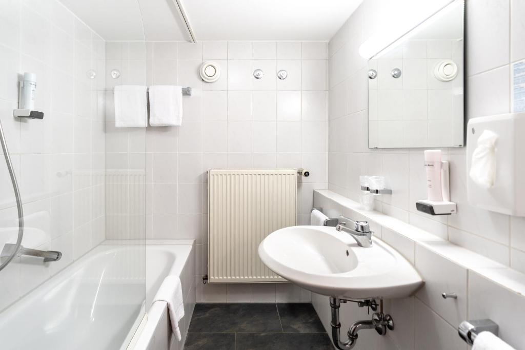 Koupelna v ubytování Hotel Hölzer Bräu by Lehmann Hotels