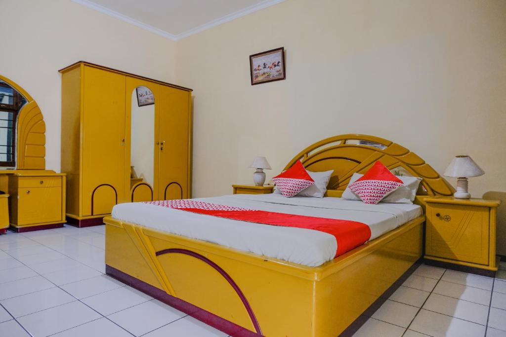 Posteľ alebo postele v izbe v ubytovaní OYO 1984 Hotel Istana Family Syariah