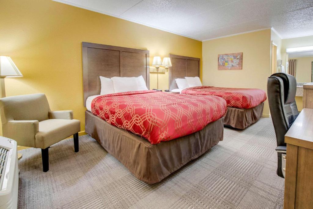 Postel nebo postele na pokoji v ubytování Econo Lodge