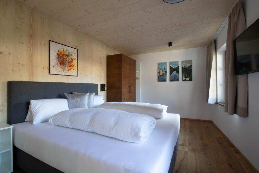 Ein Bett oder Betten in einem Zimmer der Unterkunft Wally Berg-Appartements