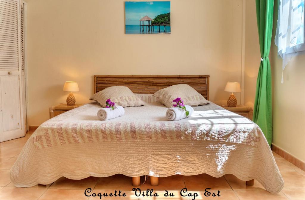Postel nebo postele na pokoji v ubytování Coquette villa du Cap Est