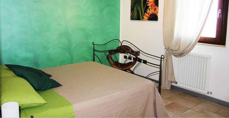 A bed or beds in a room at Il borgo