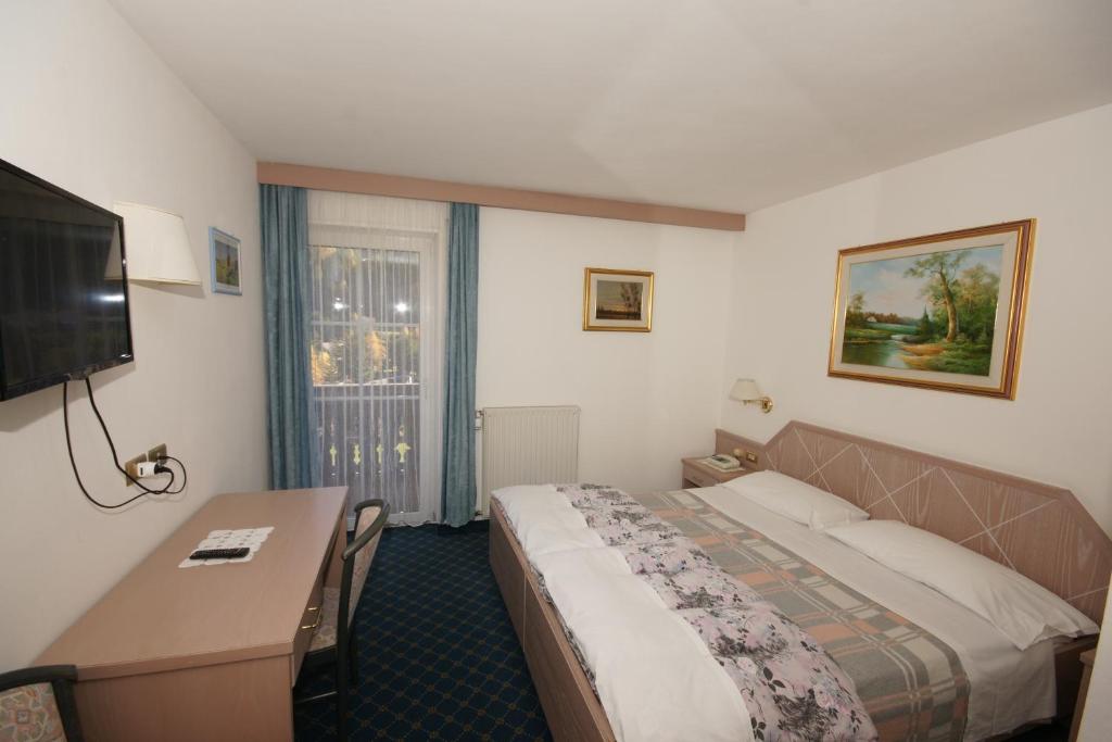 TV a/nebo společenská místnost v ubytování Hotel Villa Mozart