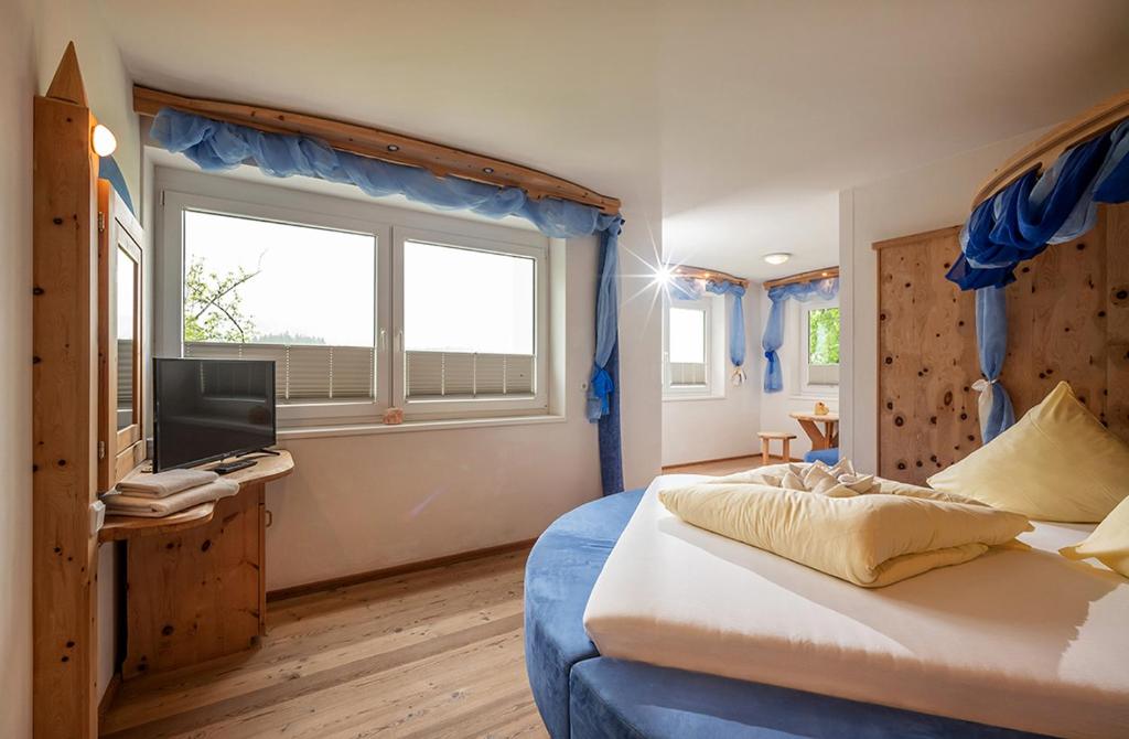 Postel nebo postele na pokoji v ubytování Bed & Breakfast Landhaus Strasser