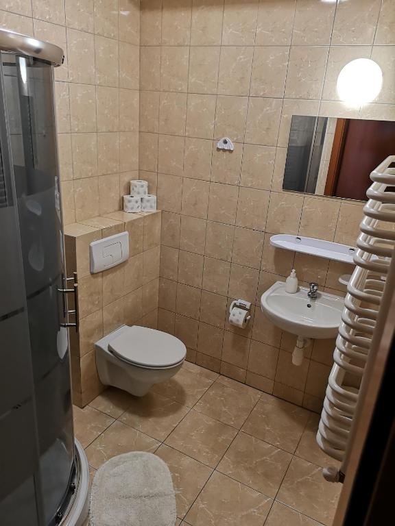 Koupelna v ubytování Hotel Duka