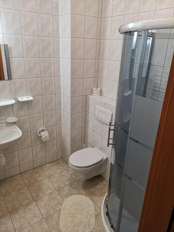 Koupelna v ubytování Hotel Duka
