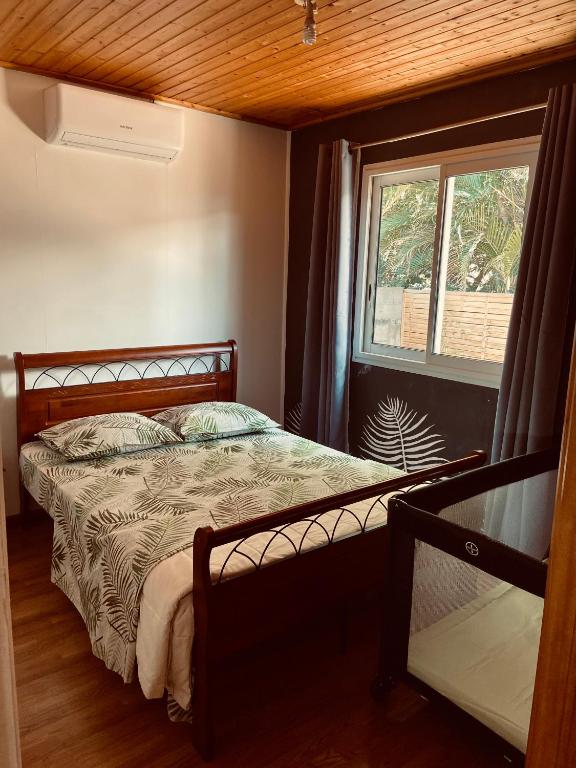 Postel nebo postele na pokoji v ubytování Le Chalet Kréol