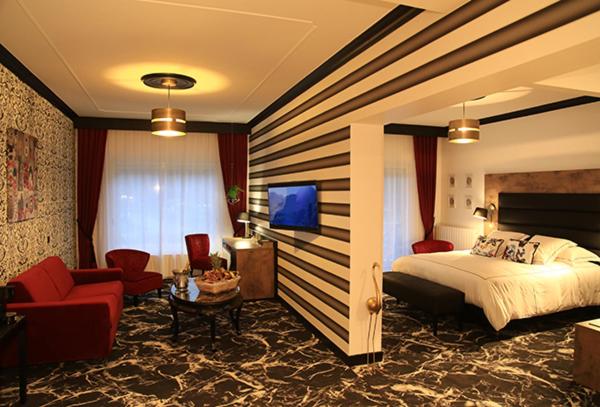 Postel nebo postele na pokoji v ubytování Hôtel du Barry Resort & Spa