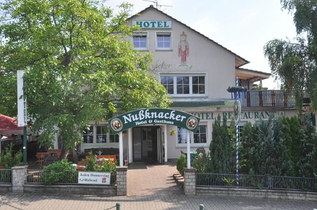a building with a sign in front of it at Hotel Nußknacker in Fulda