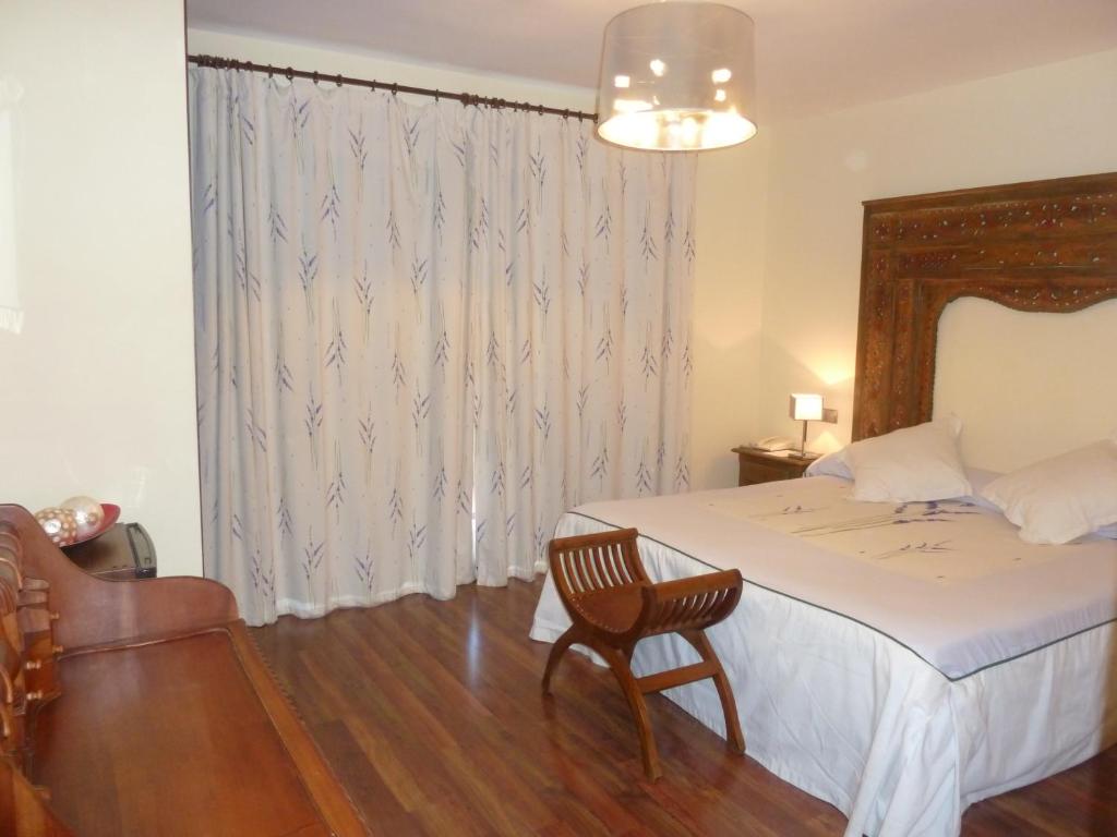 Postel nebo postele na pokoji v ubytování Hotel Sierra de Cazorla & SPA 3*