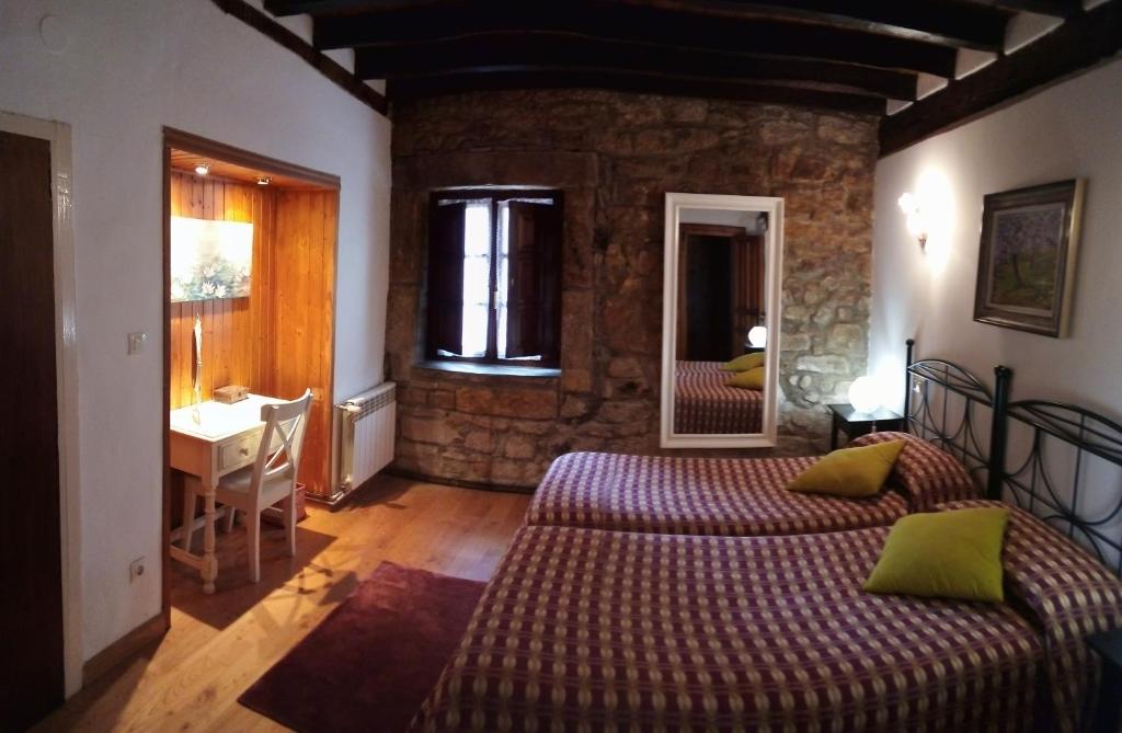 Postel nebo postele na pokoji v ubytování Apartamentos El Majuelo