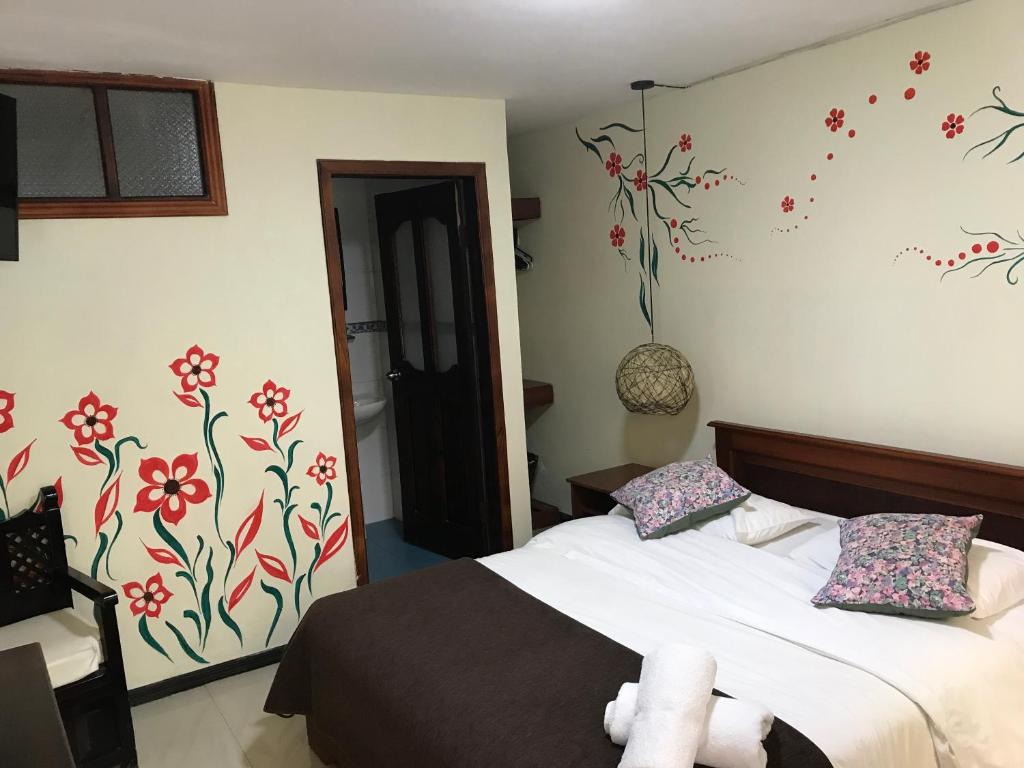 Postel nebo postele na pokoji v ubytování Posada J