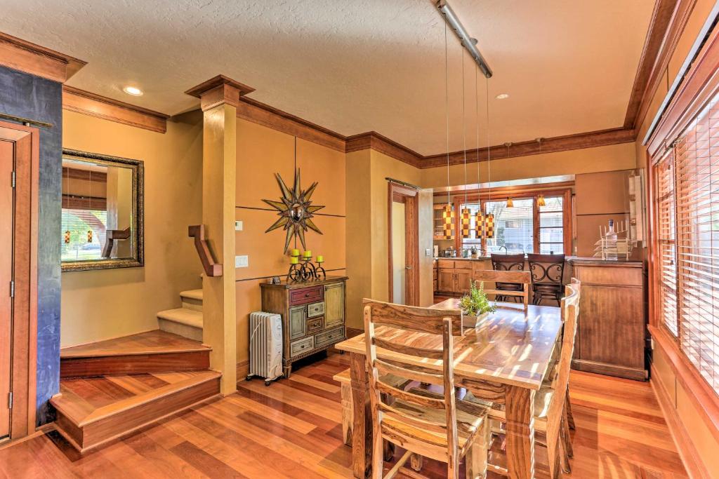 a kitchen and dining room with a table and chairs at North End Boise Home with Courtyard about 3 Mi to Dtwn! in Boise