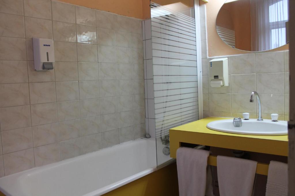 Koupelna v ubytování Hotel Napoléon