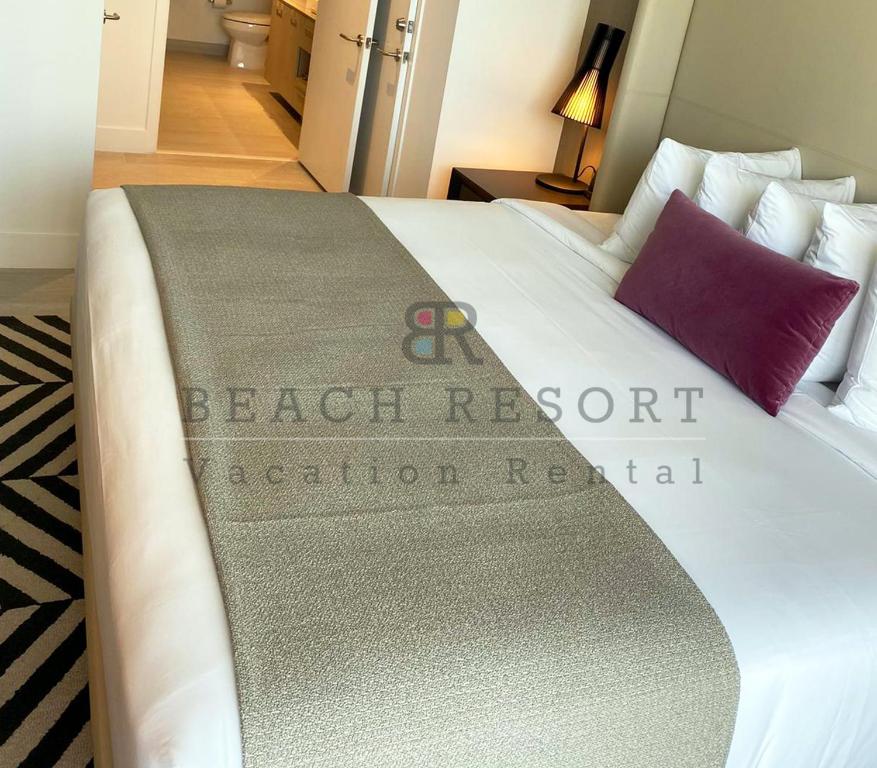 Postel nebo postele na pokoji v ubytování HYDE Beach House Apartments