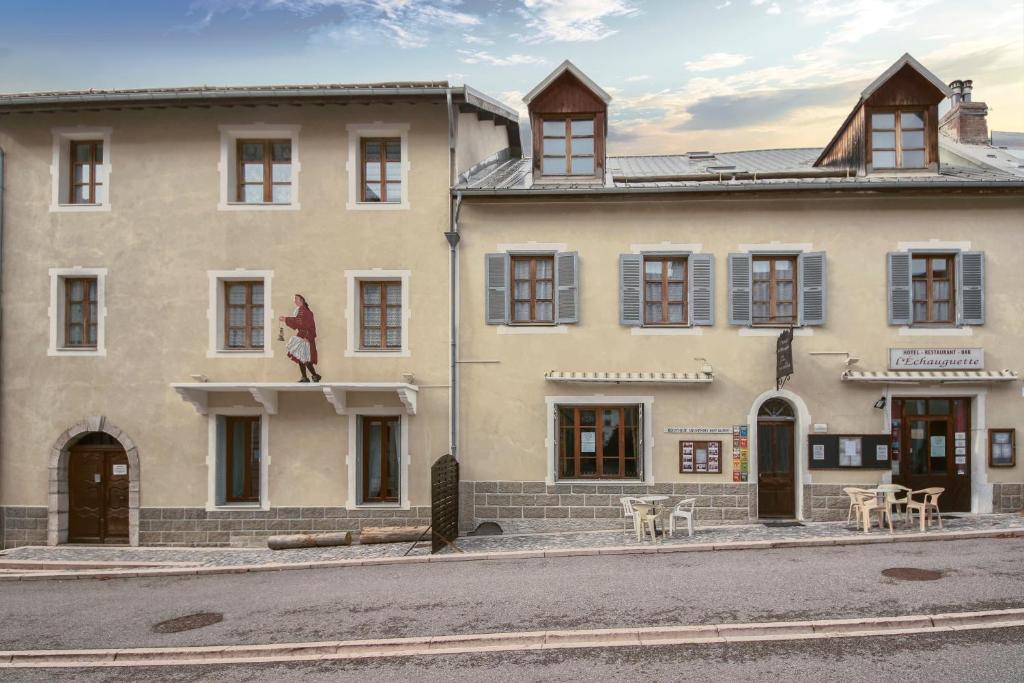 a building on the side of a street at Auberge de L'Echauguette in Mont-Dauphin