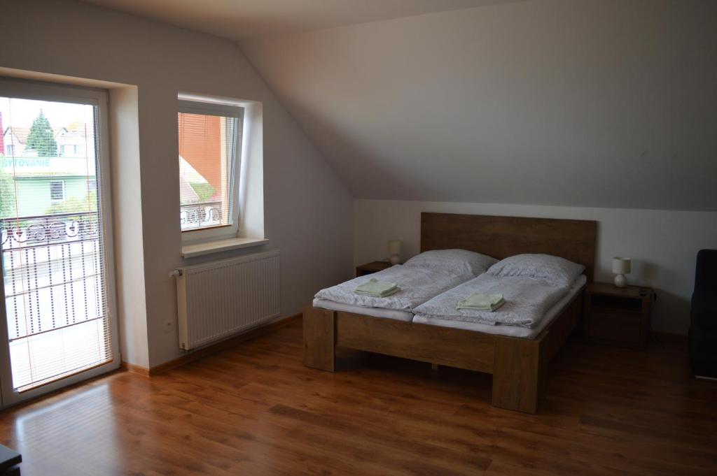 Postel nebo postele na pokoji v ubytování Ubytovanie Luky
