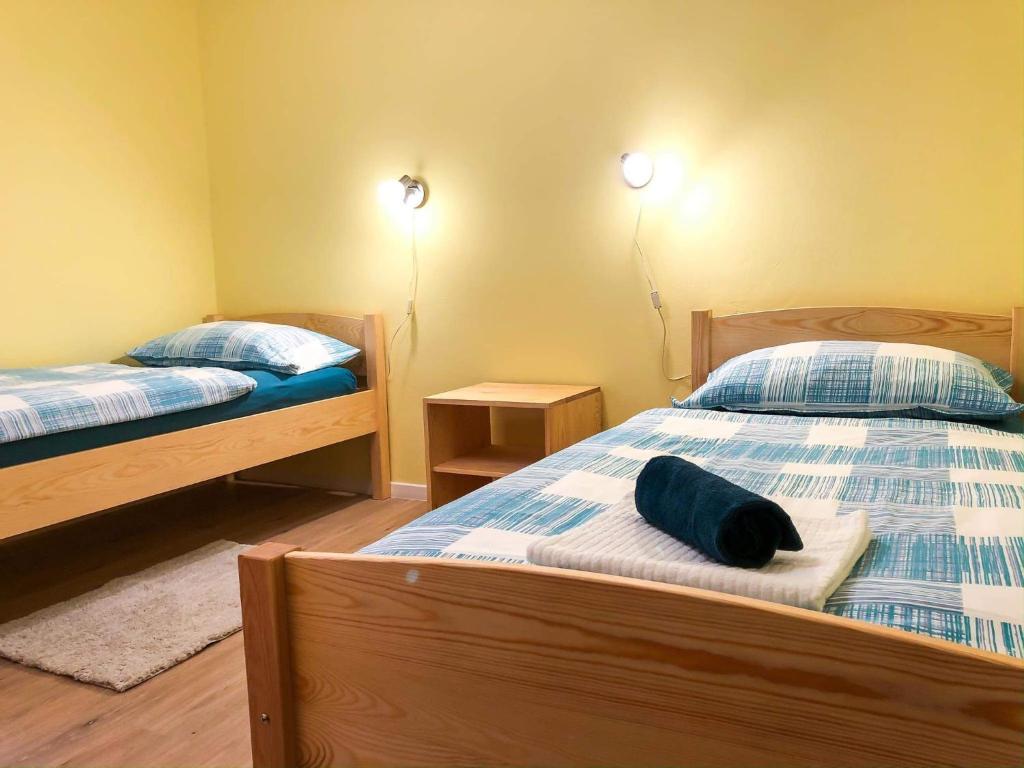 A bed or beds in a room at Apartma Bubi
