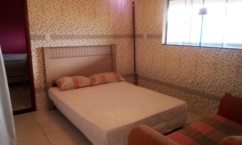  suite em casa de familia