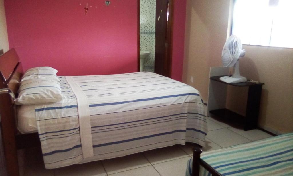  suite em casa de familia