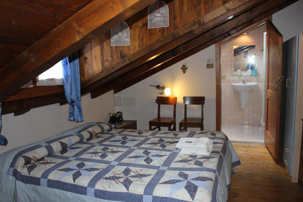 Postel nebo postele na pokoji v ubytování Bed and Breakfast Cappeler